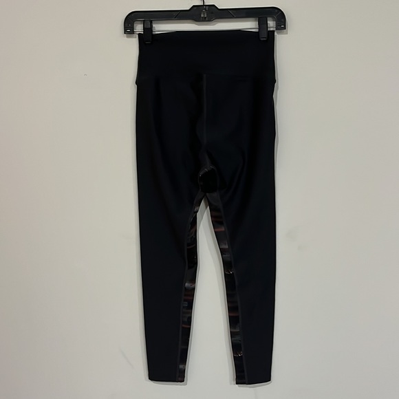 Peloton blk tights w/multi color pattern inside leg sz med 26” inseam - Picture 3 of 5
